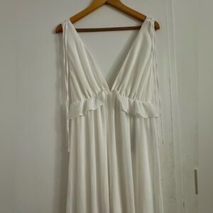 Elegant White Sleeveless  Lulus Size S White  Low V-Neck Jumpsuit